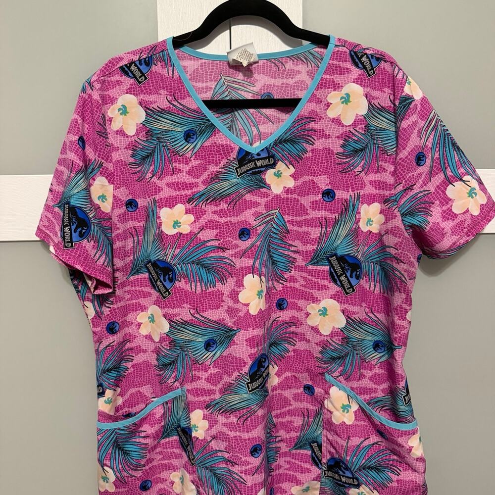 Jurassic World Dominion Women’s XL Pink Tropical Dinosaur Print Scrub Top
